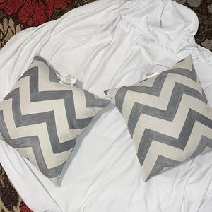 Out door pillows grey and white zigzag lines